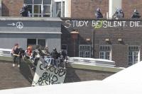 Riot police stand by as the students stage their protest at St Michael's College in Sydney